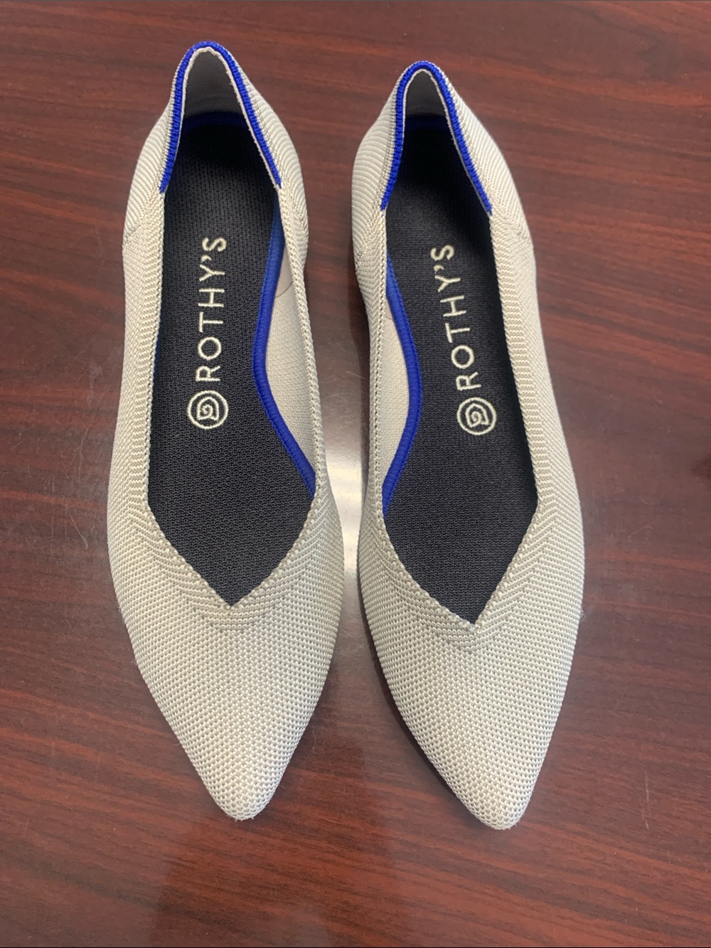 Rothy's Pointed Knit Flats in Light Tan with Blue Trim